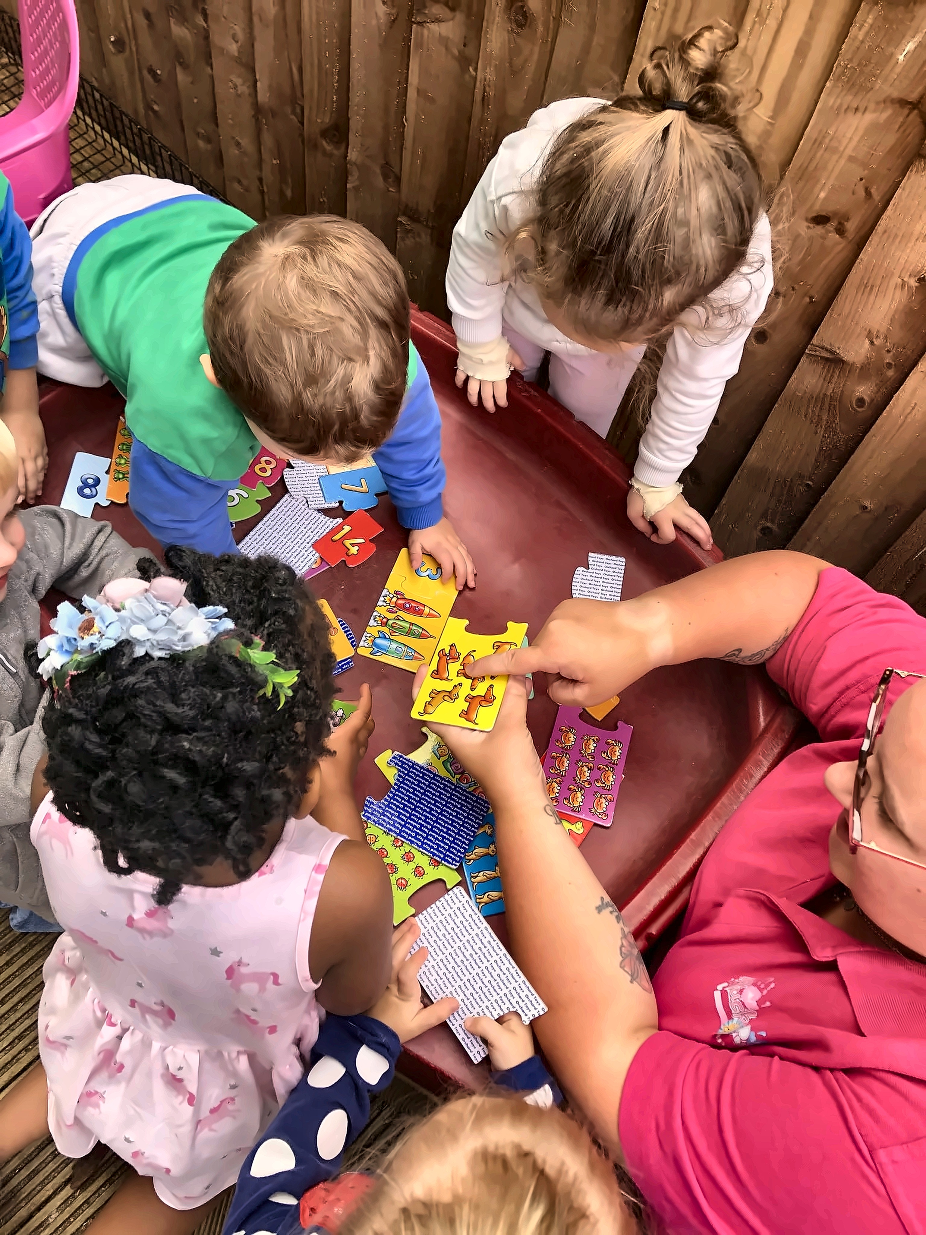 Children exploring at Mucky Pups