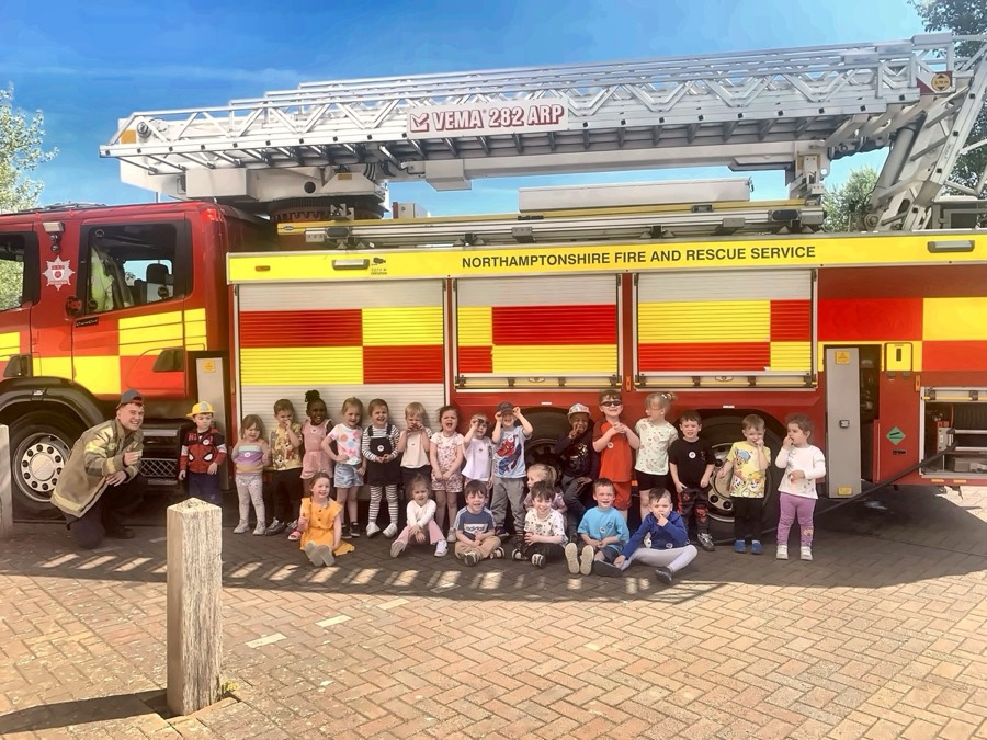 Mucky Pups children with the Northamptonshire Fire and Rescue Service